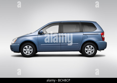 2009 Kia Sedona in base blu - Driver Profilo laterale Foto Stock