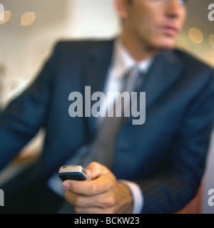 Uomo con il cellulare Foto Stock