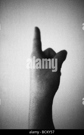 Mano che indica Foto Stock