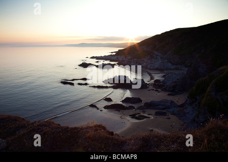 Sharrow Point e Whitsand Bay vicino al borgo di Freathy sul Cornish costa al tramonto, Cornwall, Regno Unito Foto Stock