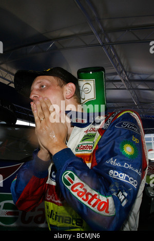 Finlandia Mikko Hirvonen festeggia con champagne nel 2009. Foto Stock