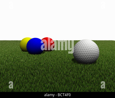 Colorate le palle da golf su erba verde Foto Stock