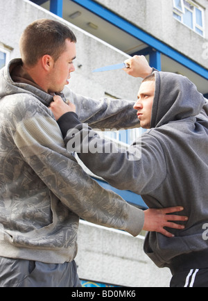 Coltello criminalità su strada urbana Foto Stock