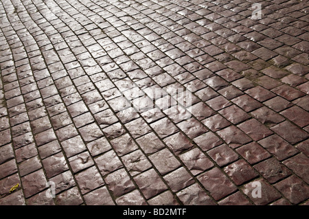 Ciottoli sulla strada possono essere utilizzate come sfondo Foto Stock