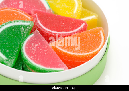 Jelly fette di frutta in scatola / caramelle gommose, rivestite di zucchero Foto Stock