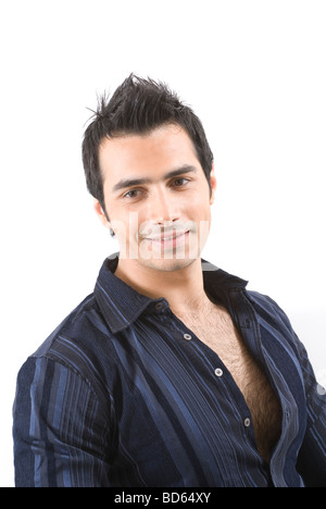 Giovane uomo sorridente Foto Stock