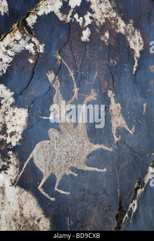 Rock carving (dipinto) in Sarmysh Gorge, Uzbekistan. Foto Stock
