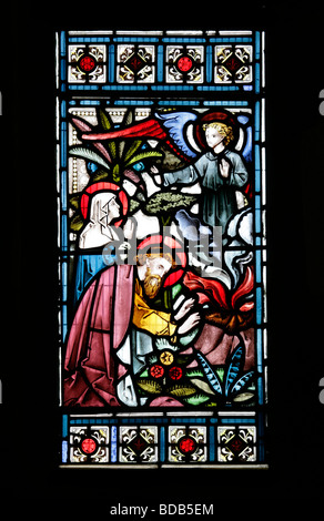 Una vetrata del 1872 di Bell & Almond raffigurante Giudici 13 3 nascita di Samson è preannunciato Earls Barton Church Northamptonshire Foto Stock