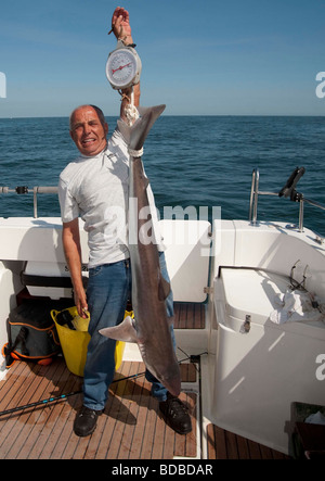 La Pesca con Lenza in mare. Tope la pesca Foto Stock