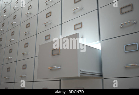 File cabinet con un cassetto aperto e la luce Foto Stock