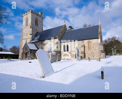 Chiesa di tutti i Santi Willian il Villaggio sotto la neve Foto Stock