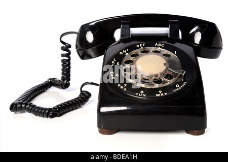 Vintage telefono nero su sfondo bianco Foto Stock