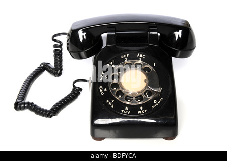 Vintage telefono nero su sfondo bianco Foto Stock