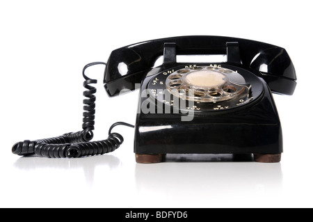 Vintage telefono nero su sfondo bianco Foto Stock