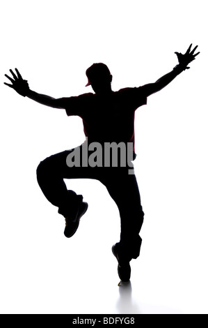 Silhouette di un giovane uomo breakdance isolato su bianco Foto Stock