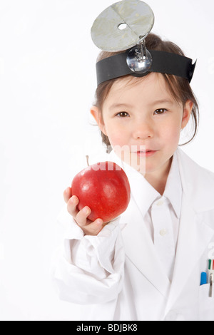 Ragazza vestita come medico Foto Stock