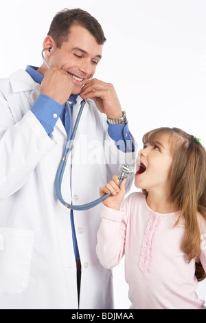 Bambina con medico Foto Stock