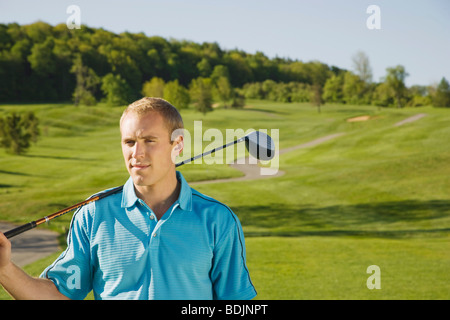 L'uomo giocando a golf Foto Stock