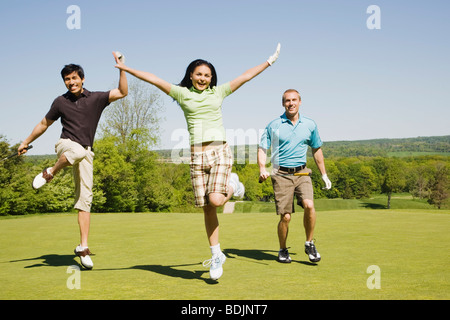 Le persone al campo da Golf Foto Stock