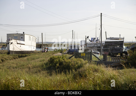 Casa barche su paludi mersea island,l'Inghilterra,uk Foto Stock