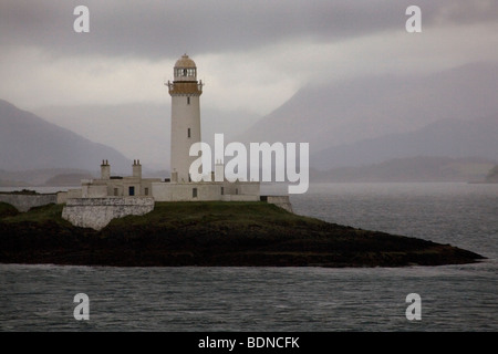 Robert Stevenson Lismore faro e della Scozia montagne più alte in tempesta da Oban a Craignure traghetto, Regno Unito. Foto Stock