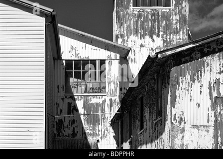 Ridondante di edifici in fabbrica con peeling paint Foto Stock