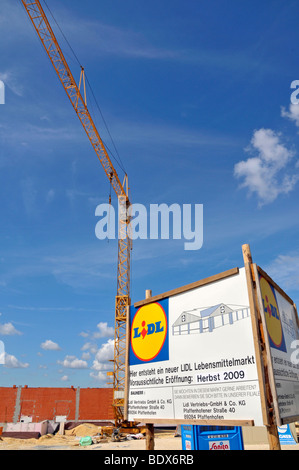 Sito in costruzione e annuncio dell'apertura di un Lidl mercato alimentare, Dornstadt, Baden-Wuerttemberg, Germania, Europa Foto Stock