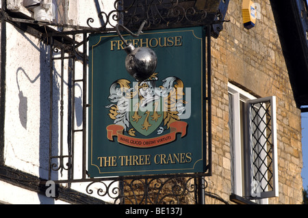 Tre gru pub segno, Turvey, Bedfordshire, England, Regno Unito Foto Stock