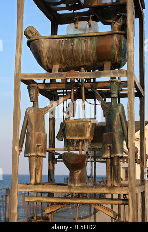 L'acqua alimentata orologio sul molo Southwold, Suffolk, Inghilterra, Regno Unito. Foto Stock