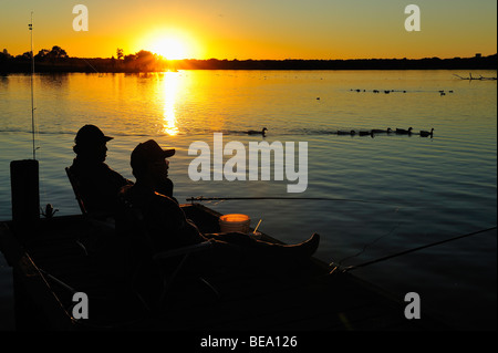 Arancione tramonto su White Rock Lake vicino a Dallas, Texas Foto Stock