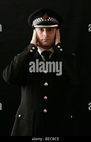 British poliziotto su sfondo semplice Foto Stock