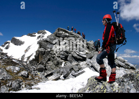 Scalatore su Stubacher Sonnblick picco, Parco Nazionale degli Hohe Tauern, Alpi Austria, Europa Foto Stock