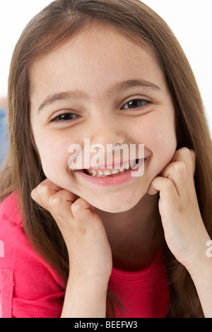 Ritratto in studio della ragazza sorridente Foto Stock