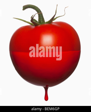 Tomatoe gocciolamento con colore Foto Stock