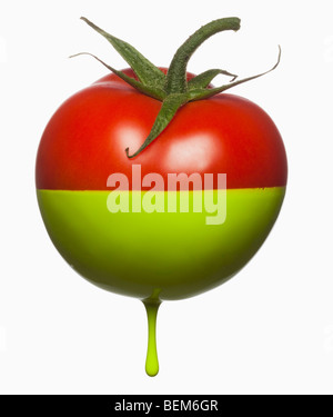 Tomatoe gocciolamento con colore Foto Stock