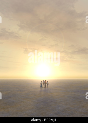 Famiglia in piedi nel deserto Foto Stock