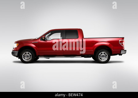 2010 Ford F-150 Lariat in rosso - Driver Profilo laterale Foto Stock