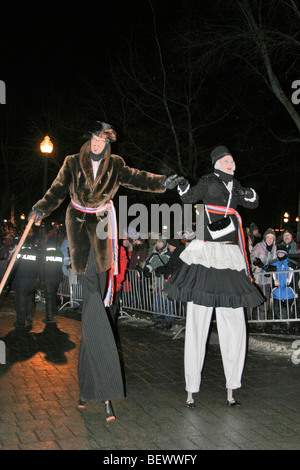 Stilt walkers at Winter Carnival parade. Quebec City, Canada. Foto Stock