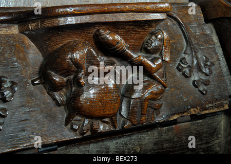 Misericord nella Basilica di Santa Maria Vergine Chiesa, Fairford, Gloucestershire, England, Regno Unito Foto Stock