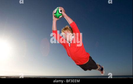 Giocatore di rugby con un punteggio provare Foto Stock