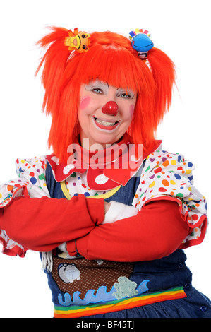 Clown con le braccia incrociate isolate su uno sfondo bianco Foto Stock