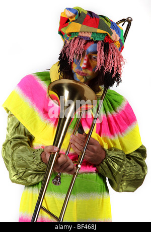 Joker attore comico clown strumento musicale giocare a tromba Foto Stock