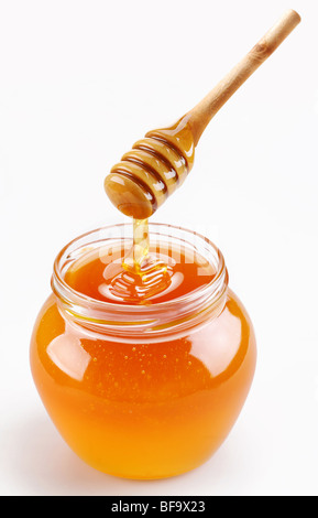 Full honey pot e miele stick Foto Stock