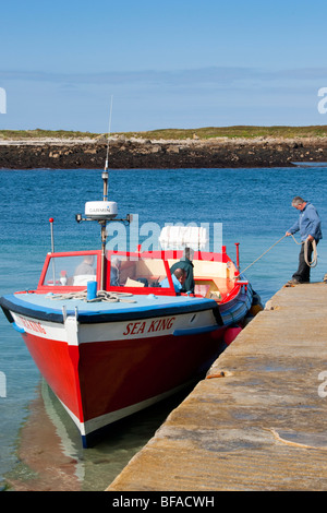 Il re del mare e Fraser Hicks accanto alla Città Bassa quay, St. Martin's, Isole Scilly Foto Stock