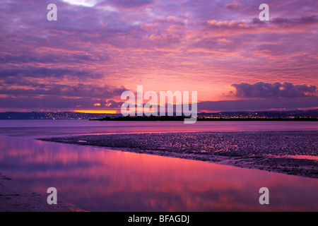 Tempo di Rock e Penzance al tramonto; Cornovaglia; da Marazion Foto Stock