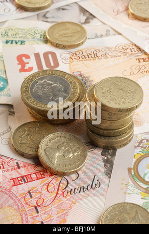 British carta moneta e delle monete metalliche in euro Foto Stock