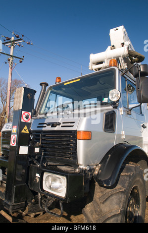 Mercedes Unimog U1200 veicolo utilitario con simon paranco e le paludi vicino a Ely Foto Stock