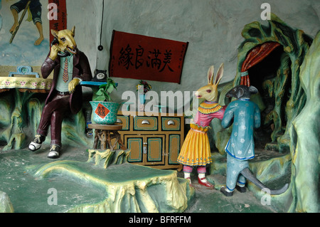 Amorosi di ratto e di coniglio o di storia racconto popolare, un cinese storia d'amore, Tiger Balm Gardens Chinese Theme Park, Singapore Foto Stock