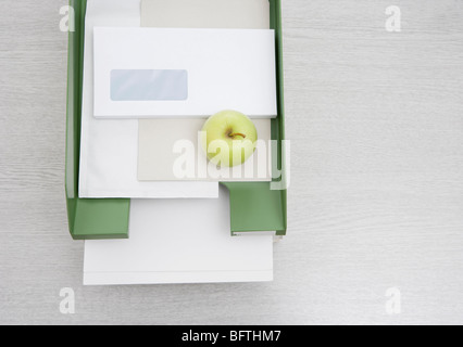 Apple in in-tray Foto Stock