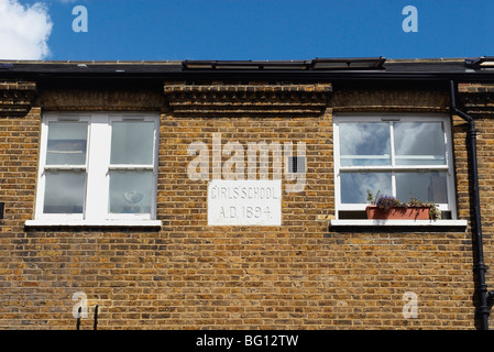 Il vecchio edificio scolastico è convertito in alloggiamento Peckham South London REGNO UNITO Foto Stock